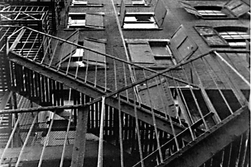 Man Walking Down the Side of a Building (1970)